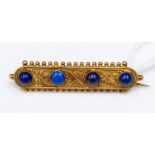 A Victorian Etruscan lapis lazuli yellow metal bar brooch,