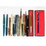 A collection of pens to include 1930s fountain pens, more modern ball points,