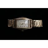 An Art Deco gentlemen's watch, rolled gold with replaced bracelet,