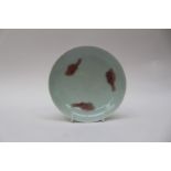 A Chinese Qing dynasty pale celadon glaze saucer dish,