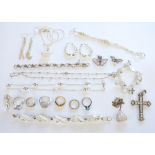 A large collection of various silver and jewellery, comprising dress rings, earrings, necklaces,