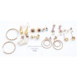 Nine assorted 9ct gold earrings to include stone set example, gross weight 20.