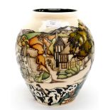 A Moorcroft limited edition vase in the Off To Market pattern 5/50,