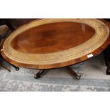 A Regency style mahogany pedestal coffee table