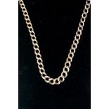 A 9ct gold watch Albert chain graduated and curb links, gross weight approximately 27.