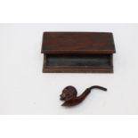 A carved 19th century Pipe together with a portable ink well set and pen tray (2)