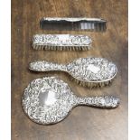A Victorian style silver four piece mounted dressing table set,