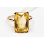 A gold citrine ring