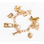 A 9ct gold charm bracelet with Welsh gold,