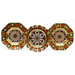 Three boxed Royal Crown Derby Old Imari 1128 pattern plates including two octagonal plates and