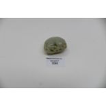 A pale jade pebble pendant: Lion Cub
