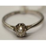 A platinum ring set with a solitaire old cut diamond, approx 0.