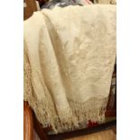 A Victorian cream hand embroidered silk shawl, having 71/2 inches hand crochet fringing,