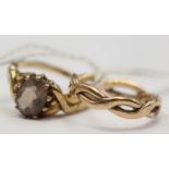 Two 9ct gold rings comprising in smoky quartz single stone ring size M and a rope style band ring