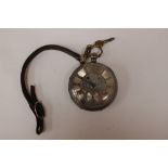 A large silver key wind pocket watch,