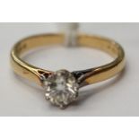 A diamond solitaire ring on 18ct gold, approx 0.