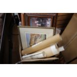 A box of framed and unframed prints,
