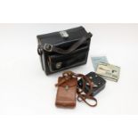 A Kodak Bellows camera in leather case.