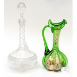 A 19th century green wine ewer with enamel detail together with a cut glass sherry decanter with