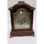 A mahogany bracket clock, silvered dial, Arabic numerals, no key,