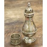 A silver sugar sifter, hallmark Birmingham 1912, maker William Neale Ltd,