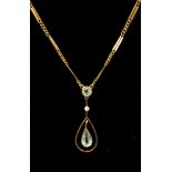 An Edwardian aquamarine and seed pearl 9ct yellow gold pendant,