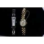 A ladies white metal Gucci watch;