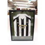 A signed Newcastle United shirt, presented by Continental, signed "To Nick, Best Wishes,