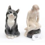 Royal Copenhagen figurines, mermaid emblem of Copenhagen and a cat (2).