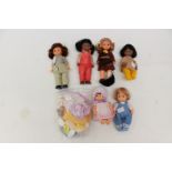 A collection of Amanda Jane dolls, with eight extra sets of clothes,