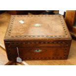 A walnut and parquetry jewel box with mother of pearl escutcheons