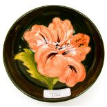 A Moorcroft Hibiscus green ground footed bowl,