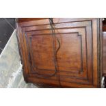 A George III oak corner wall cabinet