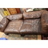 A pair of 1970s leather sofas,