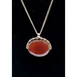 A 9ct gold swivel fob watch with bloodstone and carnelian on 9ct gold chain, 9.