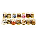A Royal Crown Derby collection of thimbles, mostly Imari,