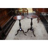 A pair of early 20th Century mahogany tripod wine tables (2)