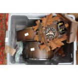A Cuckoo Clock and two mantle clocks with weights