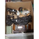 A carved 19th century Chinese deity bronze Staffordshire terriers, bronze chickens, fossils, skull,