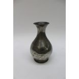 A 19th Century pewter baluster vase, stamped Compton, height 24,