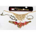 Two boxed Japanese necklaces and one costume necklace,