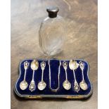 A cased set of silver tea-spoons and nips Sheffield 1893, maker John Round, weighing approx 2.