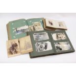 Two post card albums, including military and boats, etc,