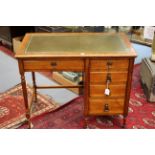 An early 20th Century oak desk,