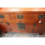 A contemporary hardwood Chinese sideboard,