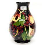 A Moorcroft bulbous vase in the 'Queens Choice' pattern, signed 'Kerri' to base,