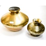 Two planished ovoid bowls the smaller possibly early 19th Century Indian sub continent,