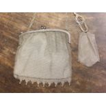 A circa 1920s white metal mesh evening bag with blue stone cabochons to clasp and triangular shaped