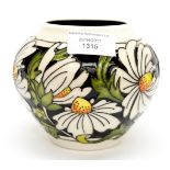 A squat bulbous Moorcroft vase in the Phoebe pattern, designed by Rachel Bishop,