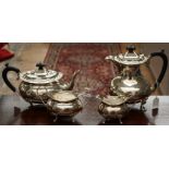 A silver tea service comprising teapot Birmingham 1929, hot water jug, Birmingham 1933, sugar,